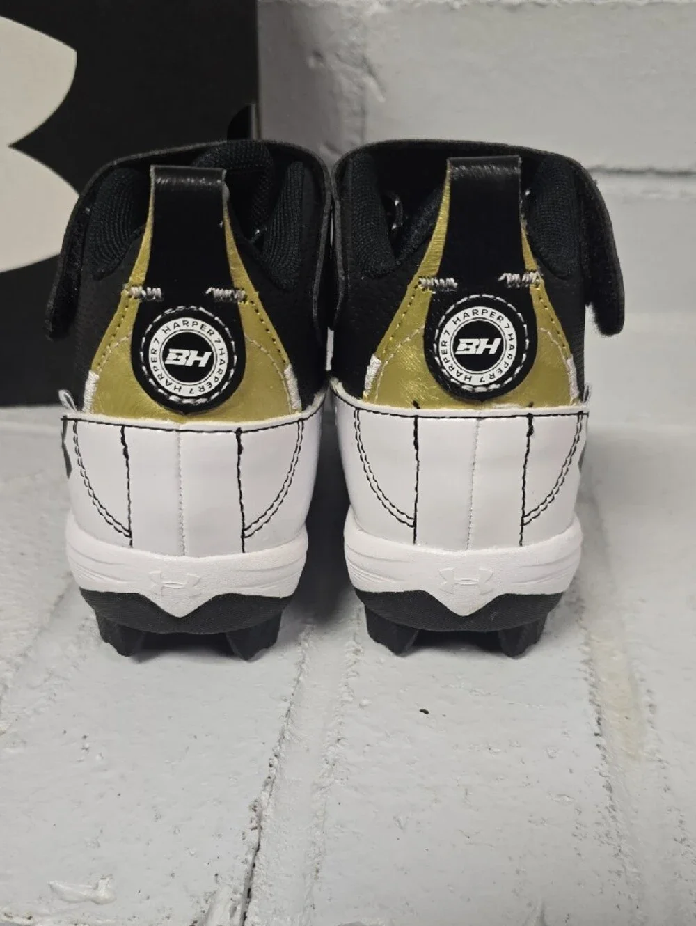 Under Armour Kids Black White and Gold Cleats with BH Strap.  Size 11k. NIB
